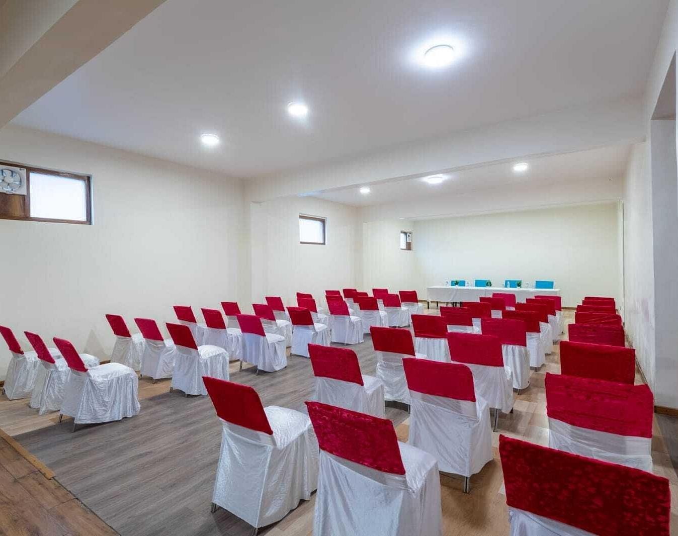 A large conference room with rows of chairs set up for a meeting or presentation  | DLS Serenity Resort and Spa